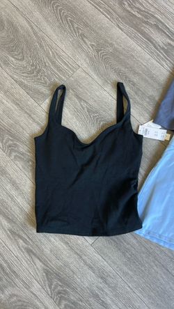 Women’s black tank and tennis skirt with built in shorts