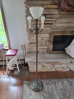 Vintage brass Stiffel 4-way torchiere floor lamp with a milk glass shade.