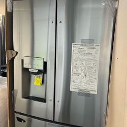 NEW IN BOX LG FRENCH STYLE STAINLESS STEEL REFRIGERATOR 