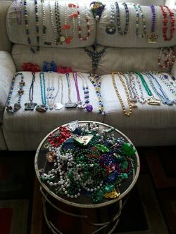 Over 100 new mardi gras beads and bracelets