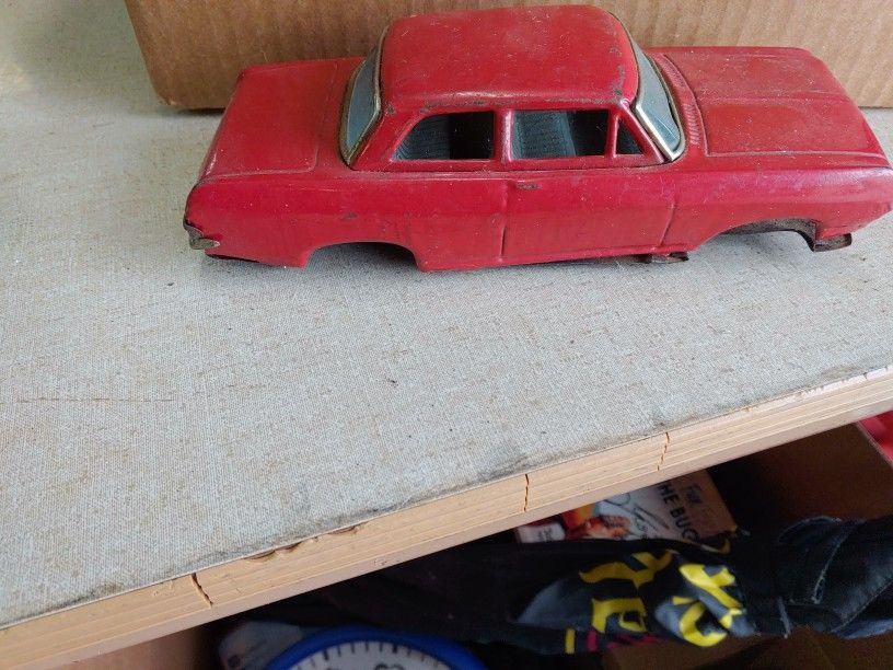 antique toy car made by Bandai, a Japanese toy company, in the 1960s. 