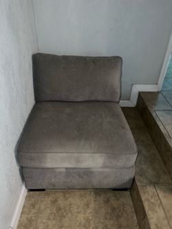 Gray single couch