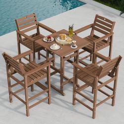 4 outdoor high chairs and a table