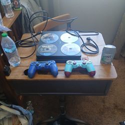Slim Ps4 With 4 Games And Two Controllers.