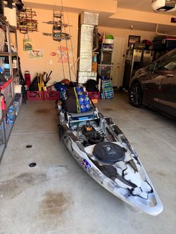 Old town fishing kayak with motor and battery