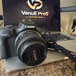 Canon R100 w/Lens