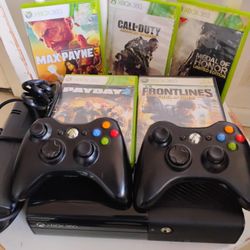 Xbox 360 E With Two Controllers Rechargeable Batteries 5 Games 