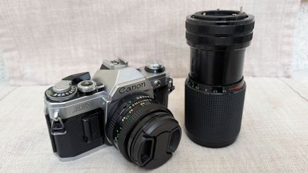 Canon AE-1 w/ 50mm prime and Tefnon 80-200mm Zoom/Macro