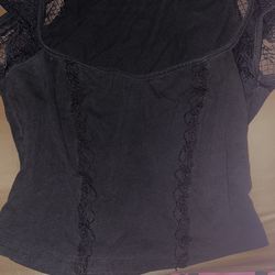 Black shirt with lace short sleeves