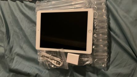 Apple iPad gen 6.       34gb of storage