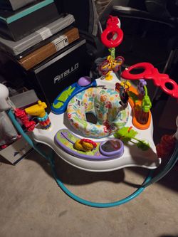Baby bouncer and activity center