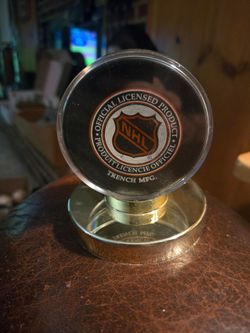 Autographed hockey puck of flyers great john leclair with coa