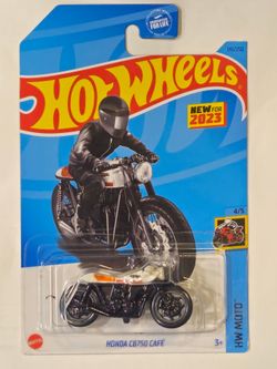 HOT WHEELS . MOTO . 1969 HONDA CB750 CAFE. (WHITE VARIATION)
