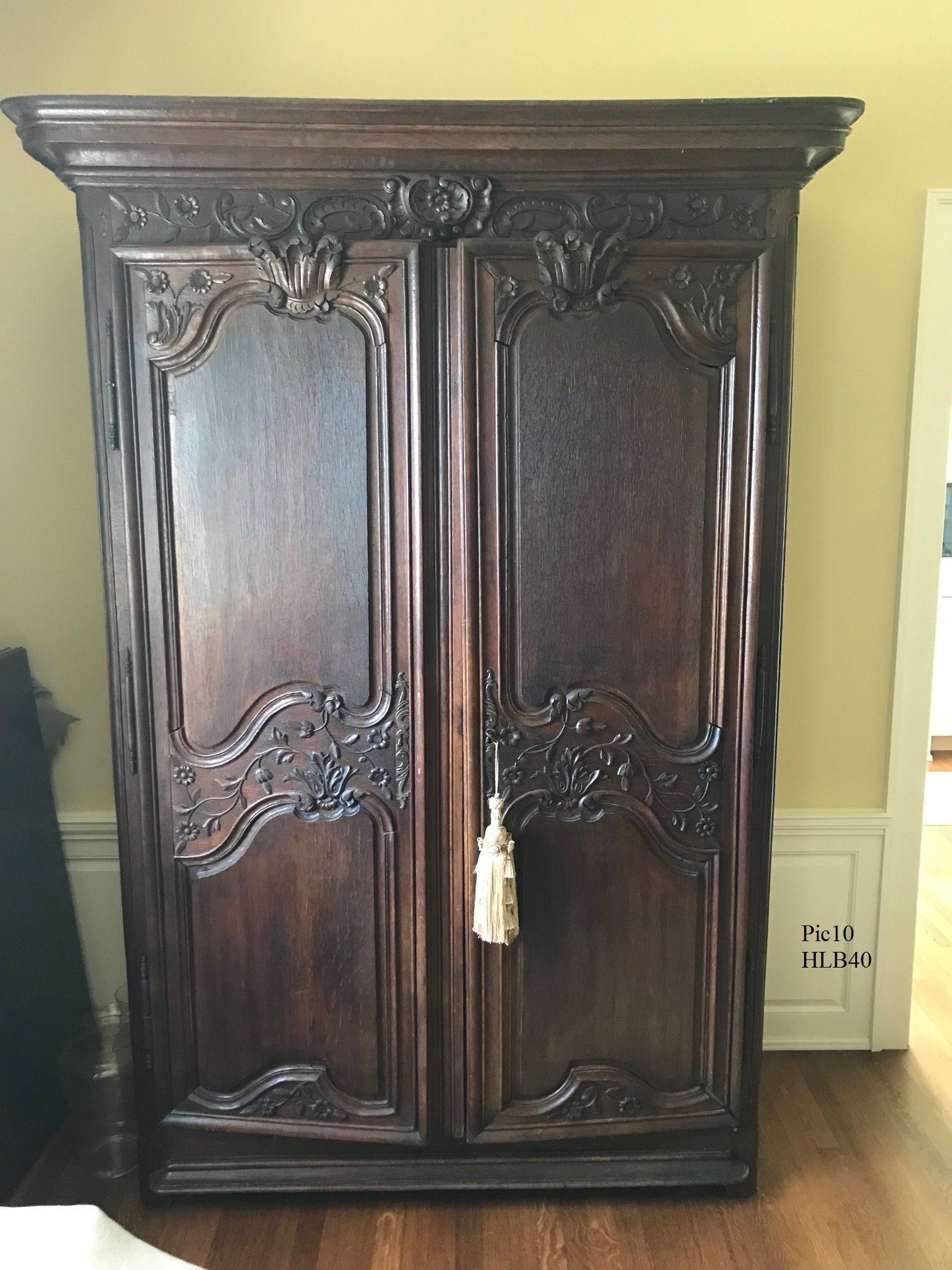 Antique French country Normandy style walnut armoire
