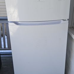 Refrigerator And Electric Stove 