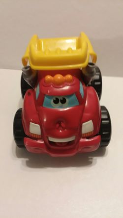 Talking dump truck moves twirls around