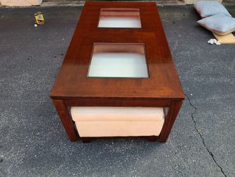 Coffee Table with hide away storage ottomans