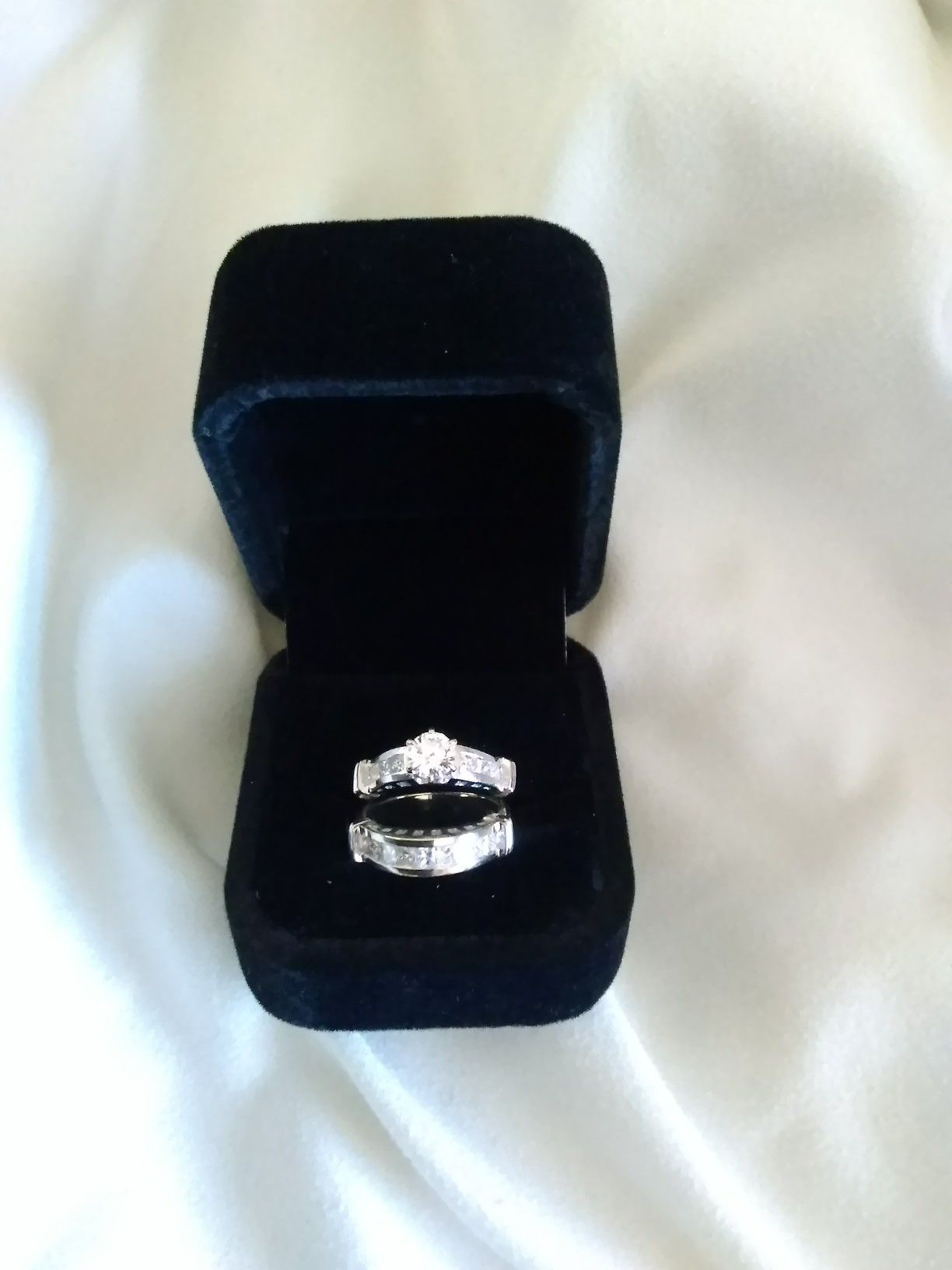 14k white gold diamond engagement and wedding ring,size 7, appraised at over $7000.00