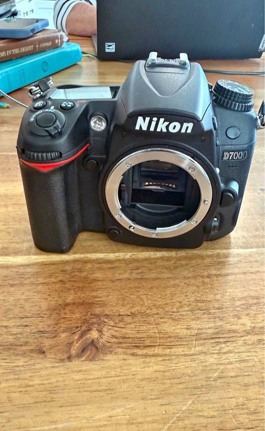 Nikon D7000 with Nikor 50mm f1.8 lens & Nikon 18-55mm f3.5-5.6 lens.