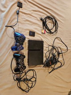 Playstation 2 slim + controllers and memory card
