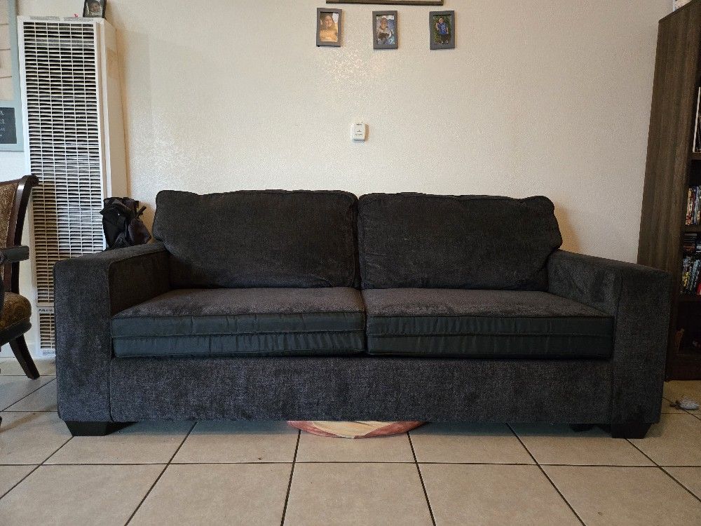 “2 Matching Couches – Great Condition, Priced to Sell"