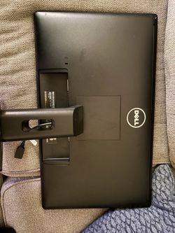Dell Computer Monitor with Stand,and a ps4 pro slim.