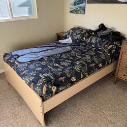 Full size bed with custom surf design bedding