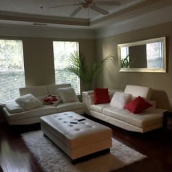 New White leather Sectional w/Ottoman Included!!