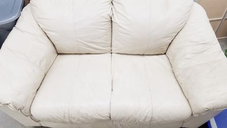 Leather cream love seat
