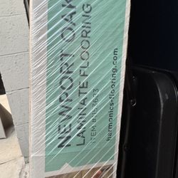 3 packs of 10 each, of laminated wood flooring