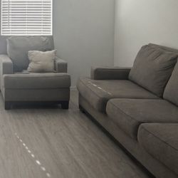 Ashley Kaywood, gray sofa and matching chair