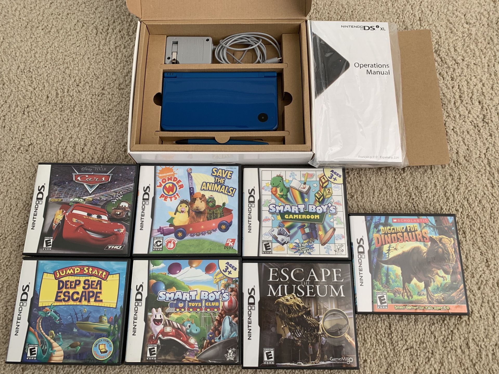 Nintendo DSi XL excellent condition with 7 games