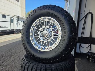 18" KMC ATTACK rims w/ 35" RT tires