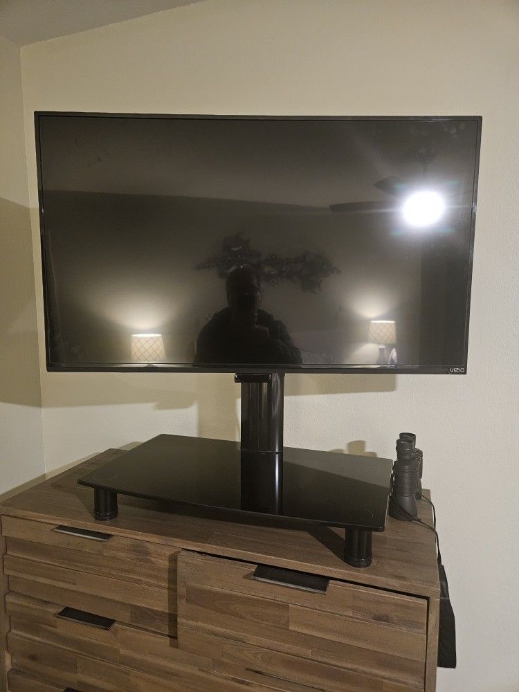 T V