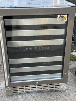 24 Inch Built In/Freestanding Wine Cellar with Automatic Defrost: Stainless Steel/Black