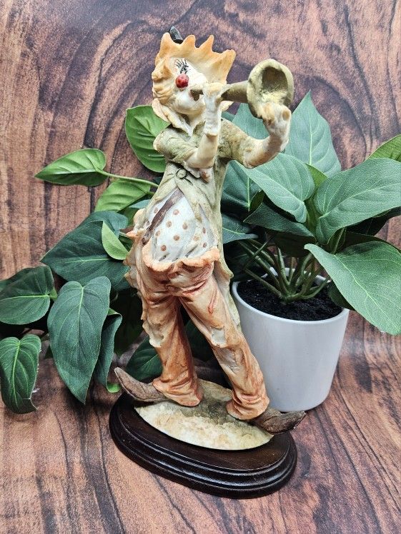 Vintage 1980's Arnart Pucci Musical Hobo Clown Playing Horn Statuette Figurine on Wood Base Each figurine is approximately 12"h x 5"l x 3 1/2"w there