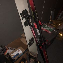 Burton Snowboard Skis Polls And 2 Pair Boots