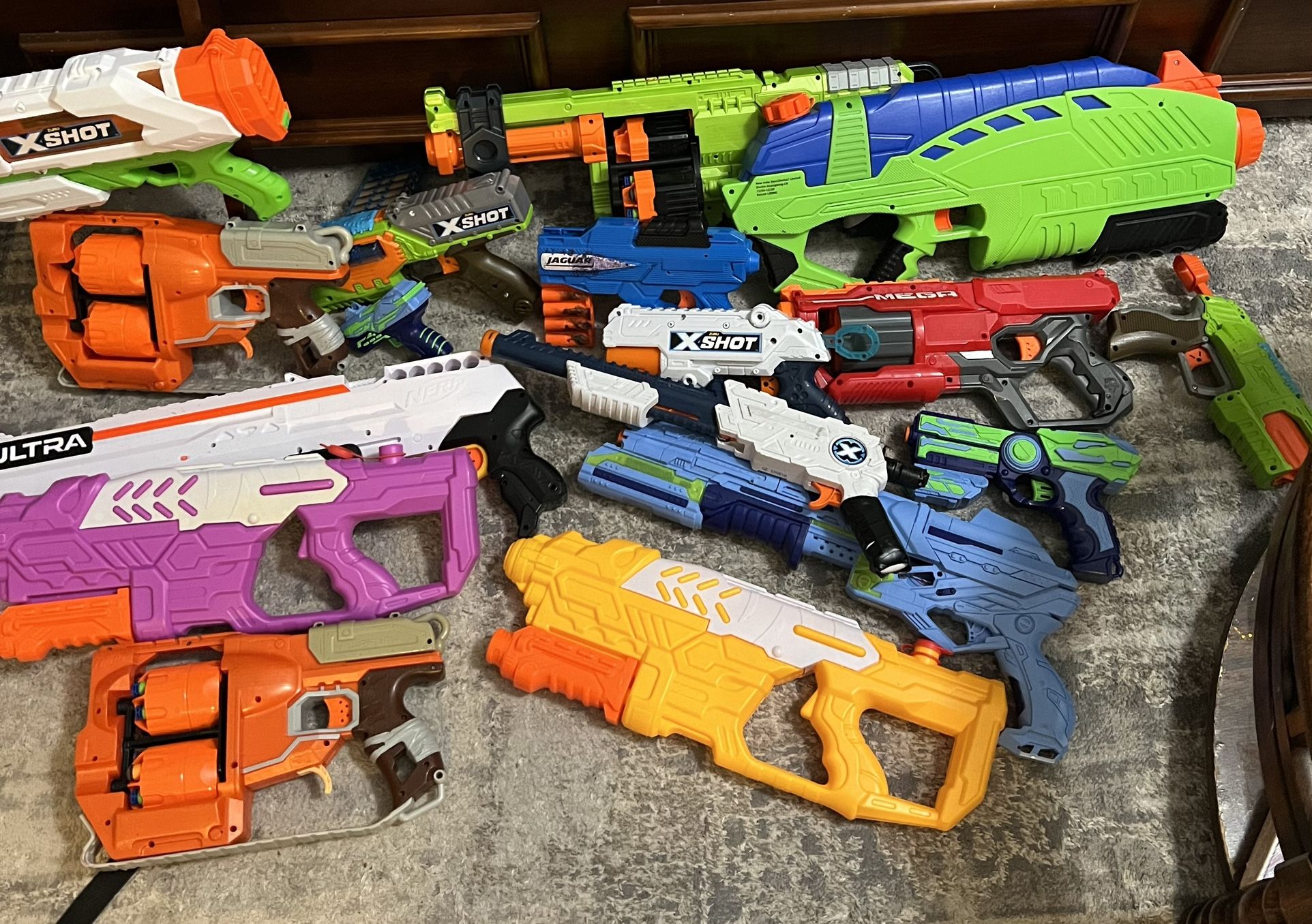 A Lot Of Nerf Guns And Water Guns