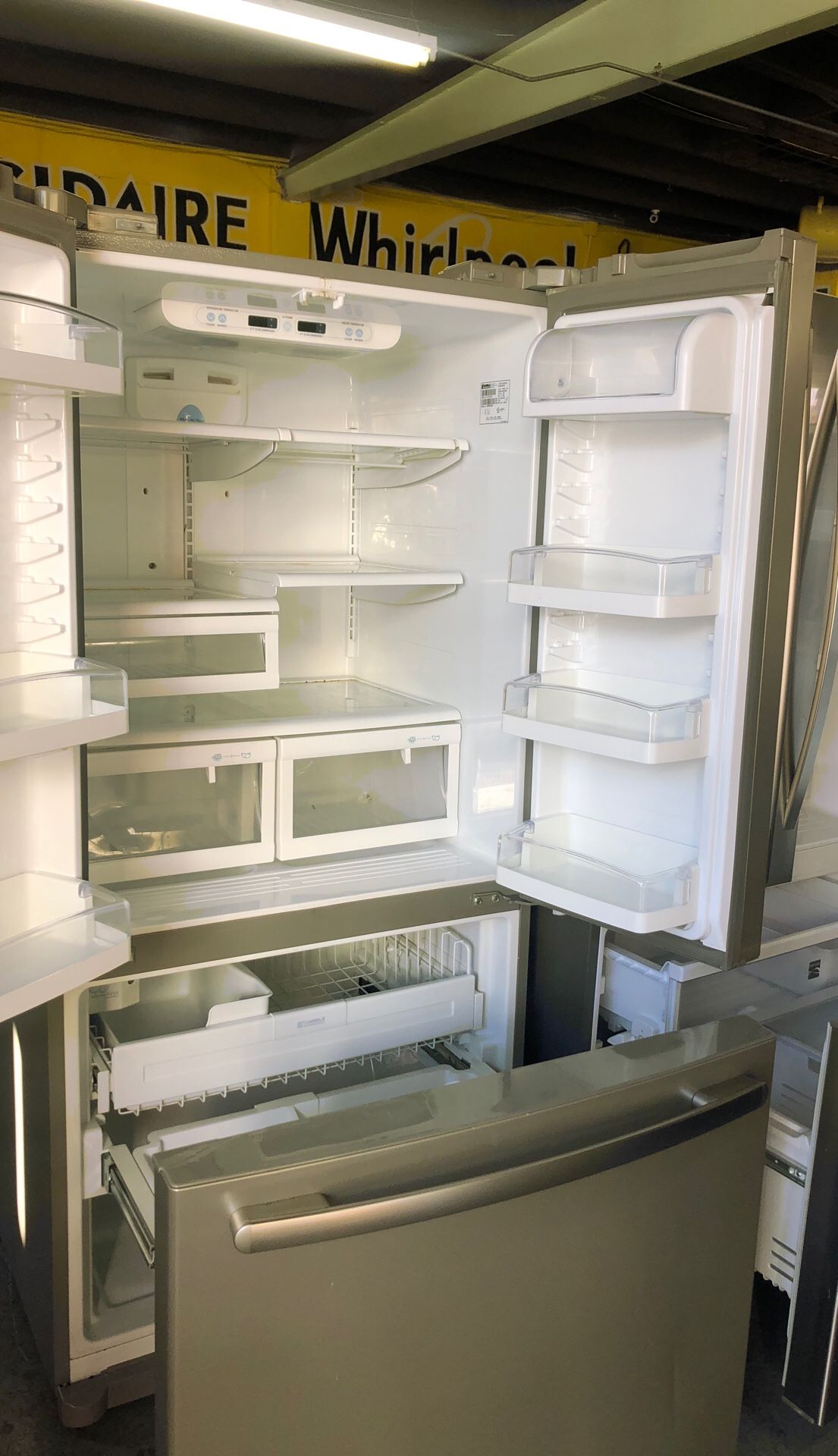 Kenmore 3 doors Stainlees steel $450. Apartament sizes