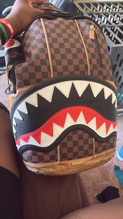 Spray ground backpack