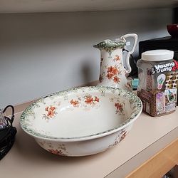 Porcelain Pitchers And Bowl