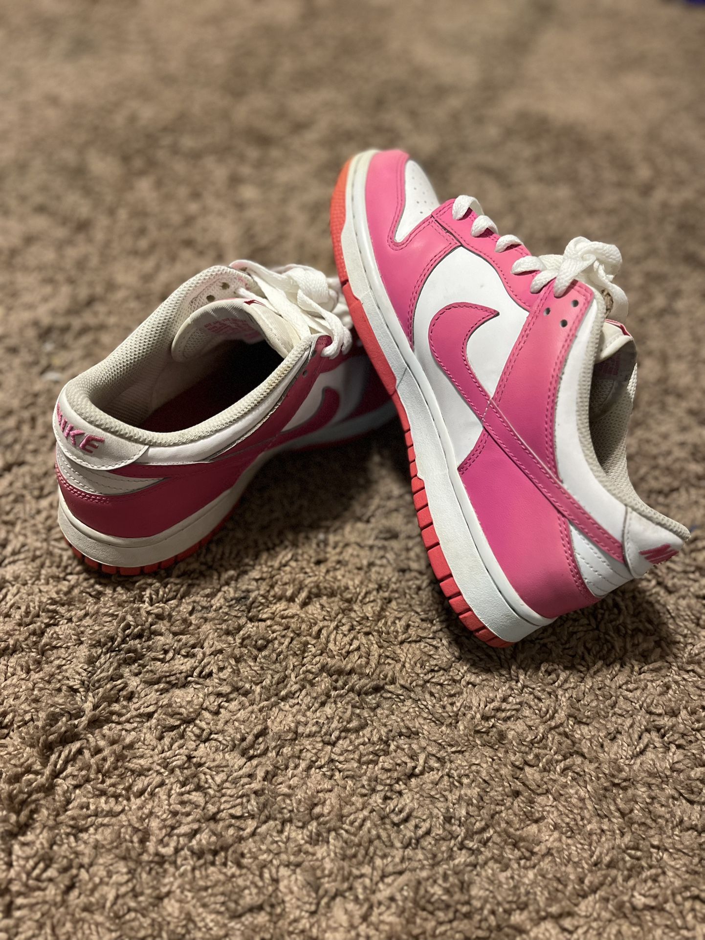 Pink and white Nike dunks