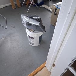 E90 passenger headlight