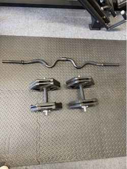 Pair of 45lb adjustable dumbbells and curl bar
