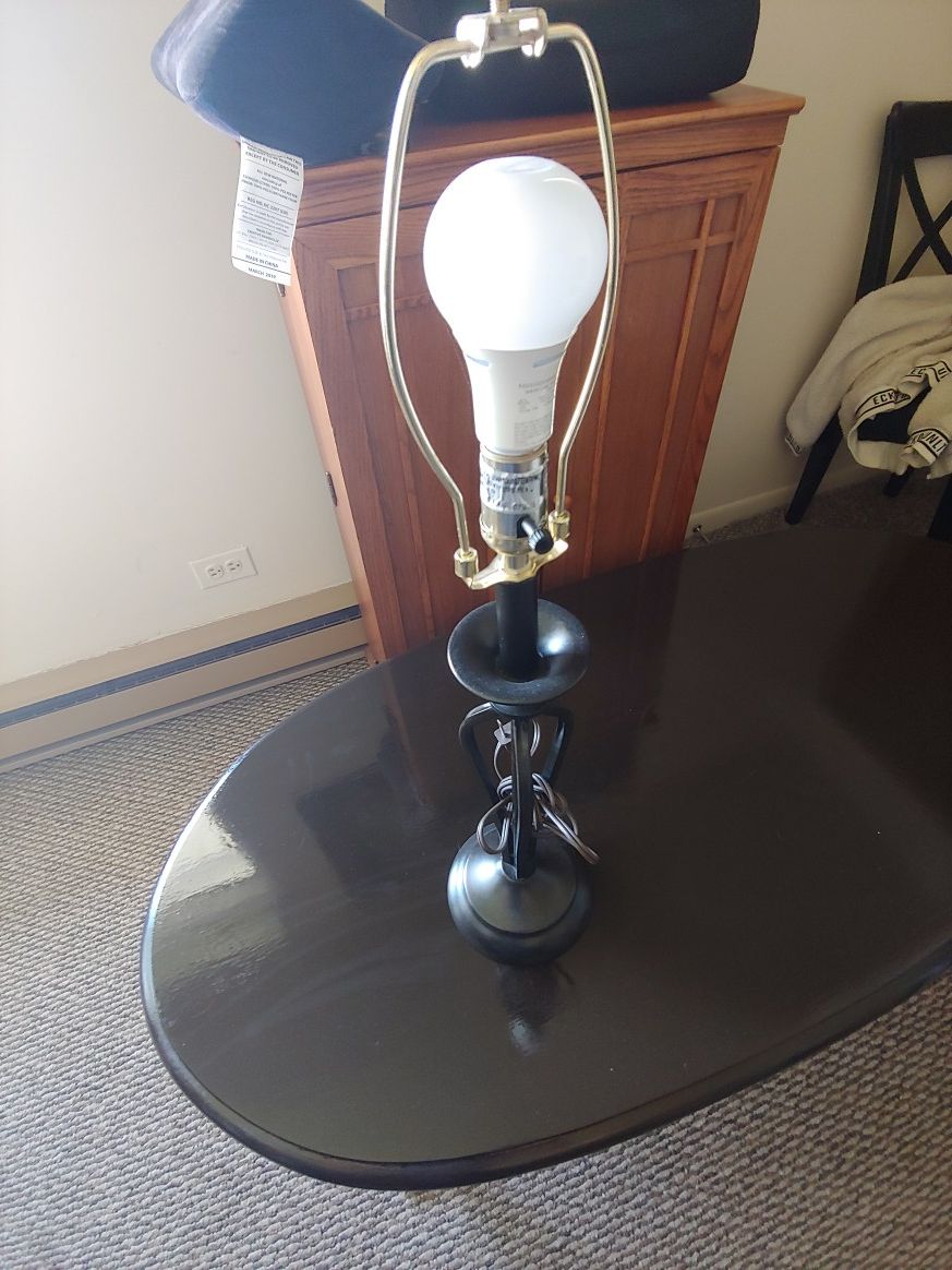 Lamp, coffee table and bookshelf