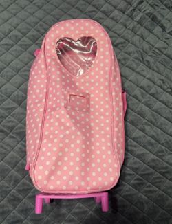 Rolling doll carrier / backpack
