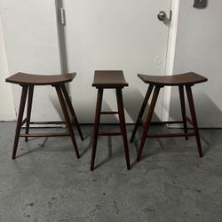 3 wooden bar stools. $25 each. h: 2 ft