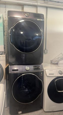 Samsung Front Load Washer & Dryer Set — Black Stainless, Steam, Stackable