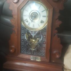 I Have An Very Old Grand Mantle Clock Ot Winds With The Key And I Have The Key And The Atatchment That Goes On The Key To Wind. 