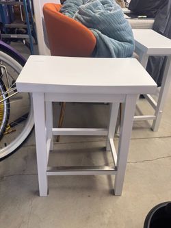 2 white stools